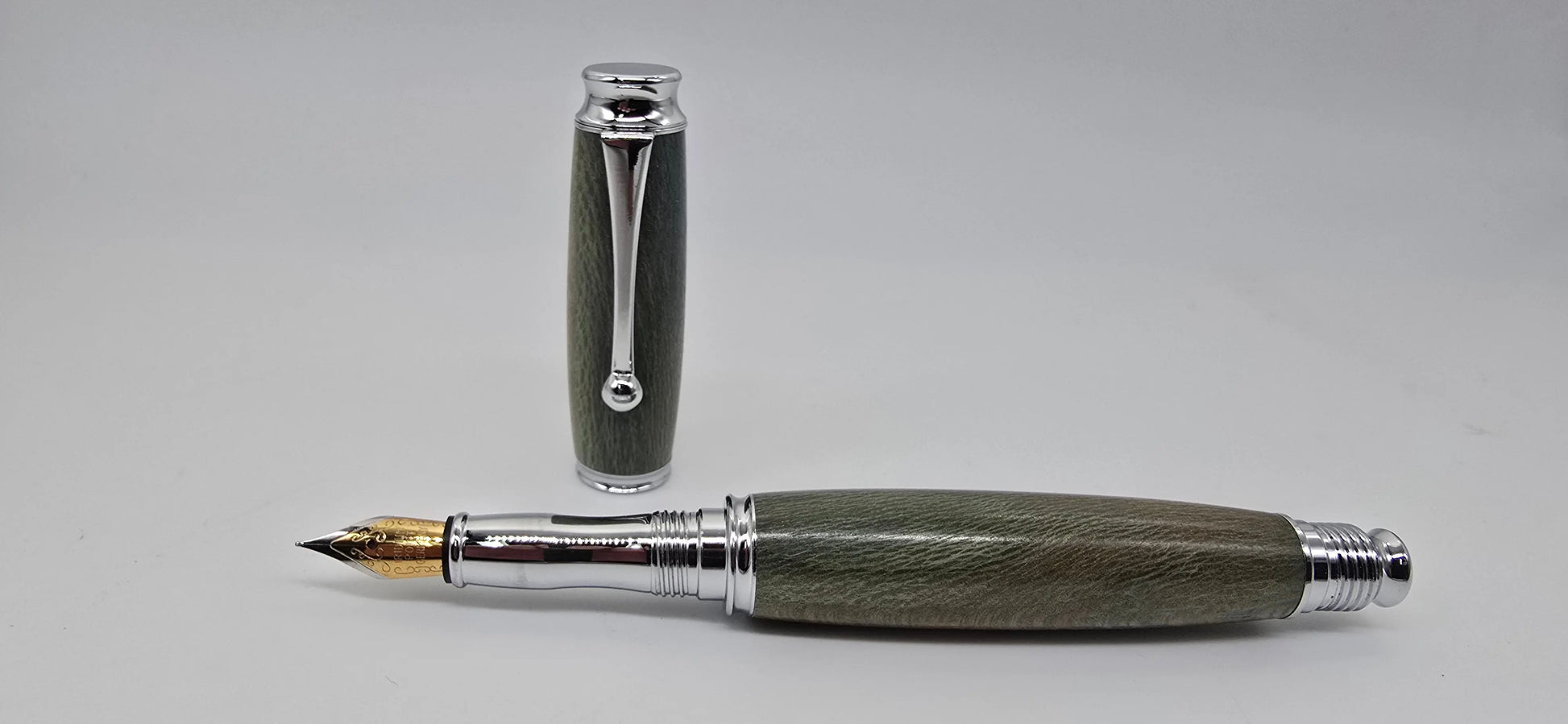 Fountain pen in dyed Lacewood from Powderham Castle Devon. 