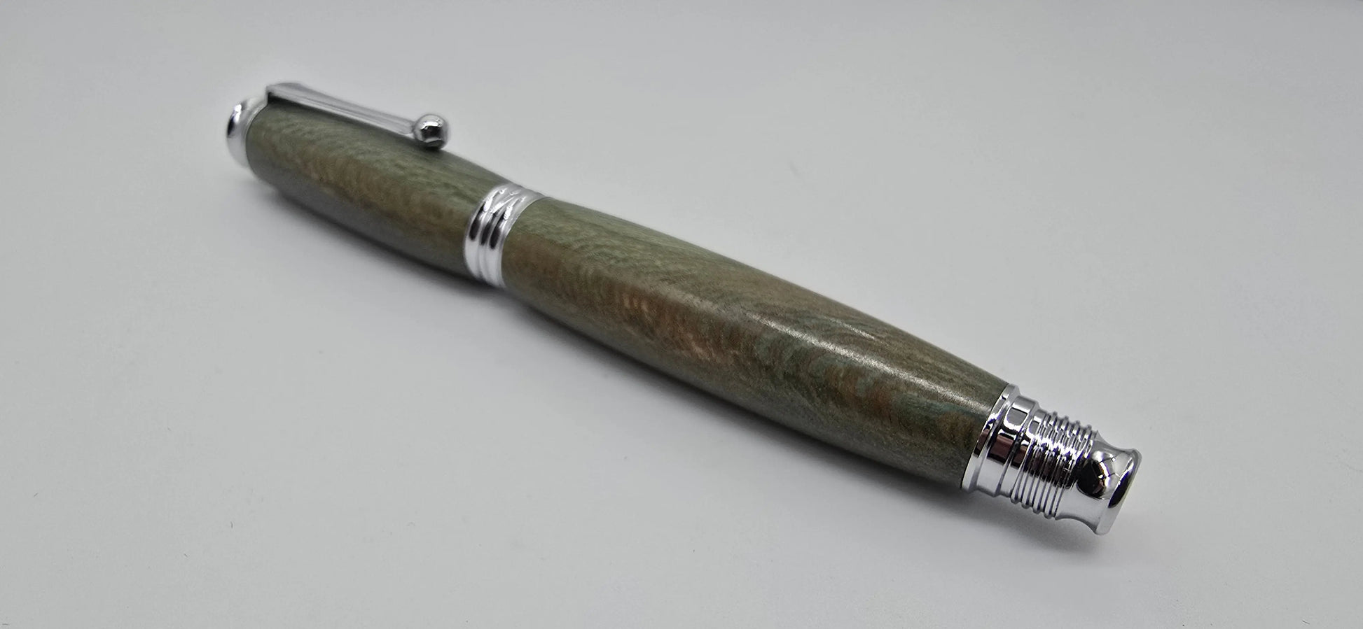 Fountain pen in dyed Lacewood from Powderham Castle Devon. 