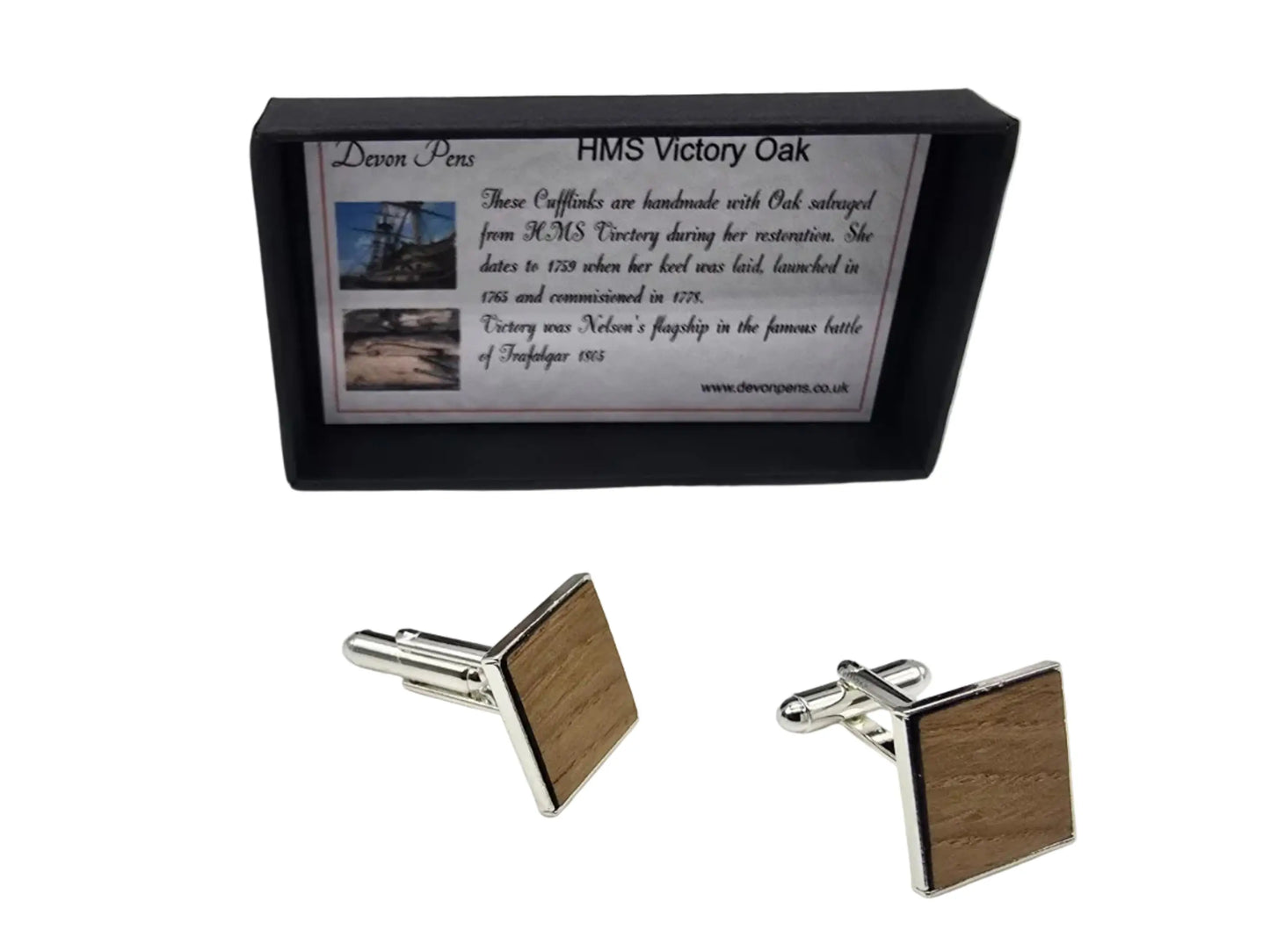 Wooden cufflinks with silver accents on a white background