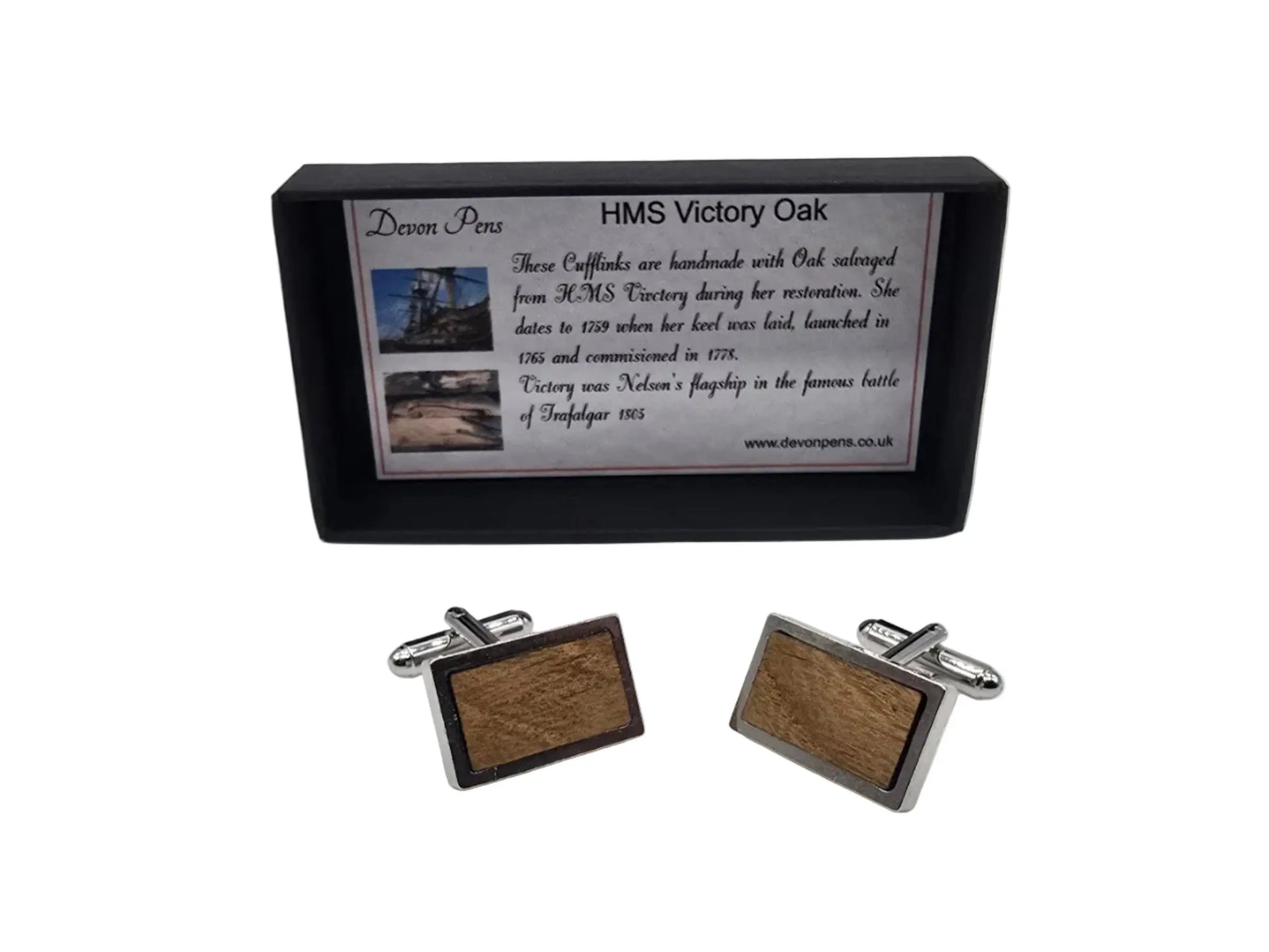 Wooden cufflinks with a black box on a white background