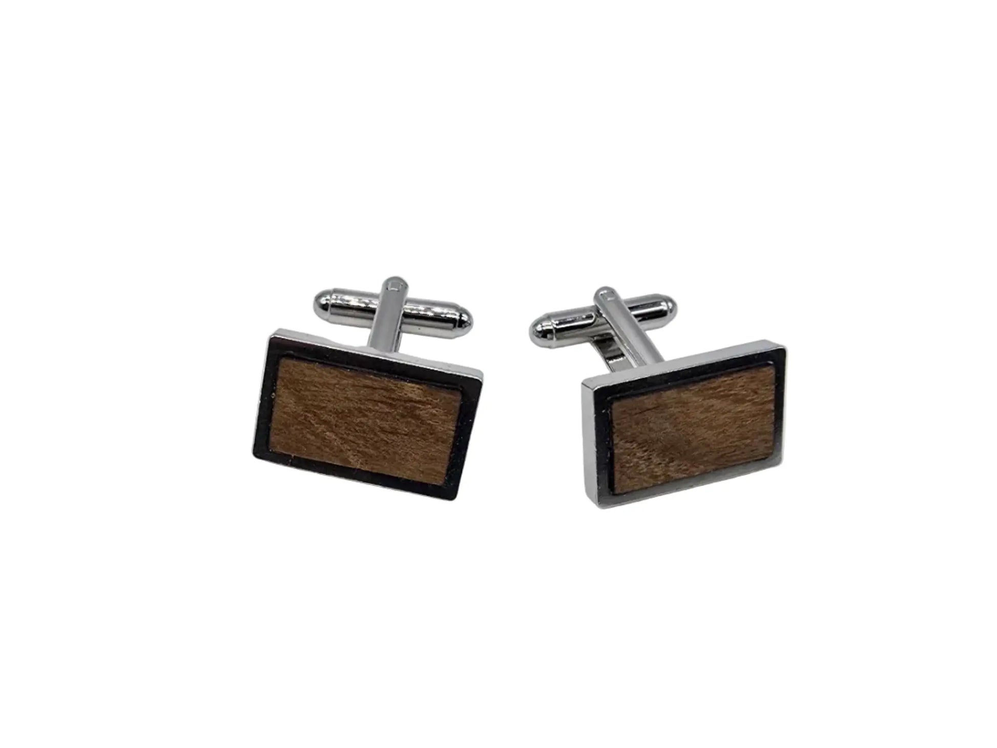 Wooden cufflinks on a white background