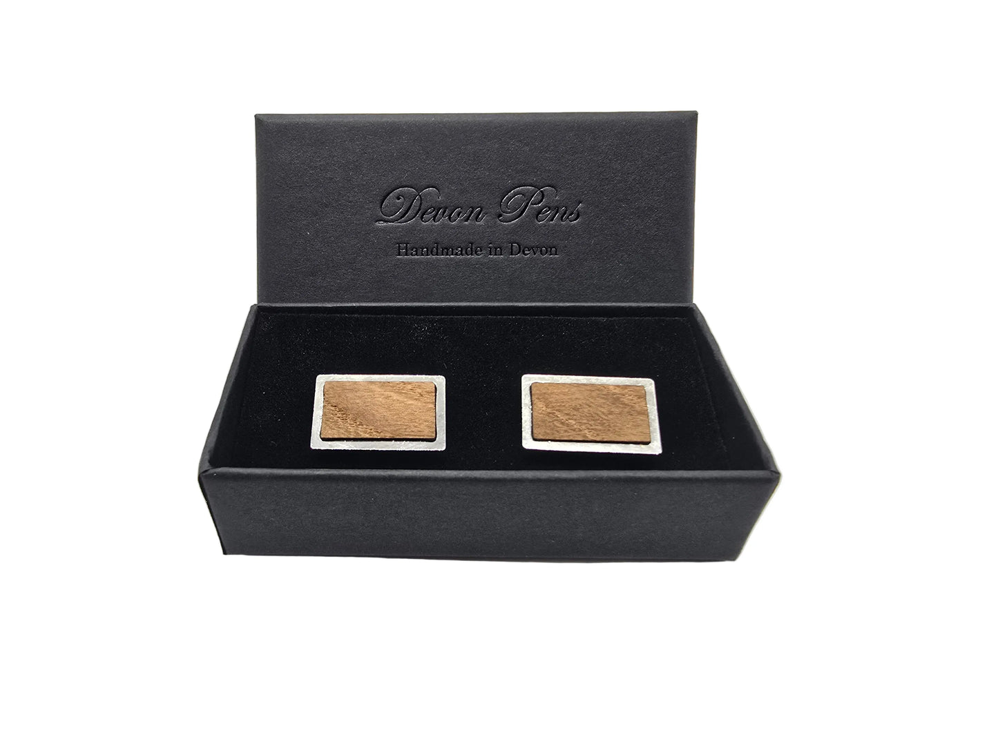 Two square wooden items in a black Devon Pens box on a white background