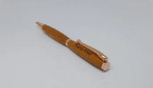 Ballpoint pen & desk stand handmade in Iroko wood from Phoenix Wharf, Plymouth. DevonPens