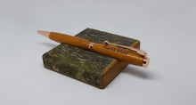 Ballpoint pen & desk stand handmade in Iroko wood from Phoenix Wharf, Plymouth. DevonPens