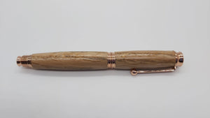 Rollerball pen in Holm Oak from Max gate, former home of Thomas Hardy DevonPens